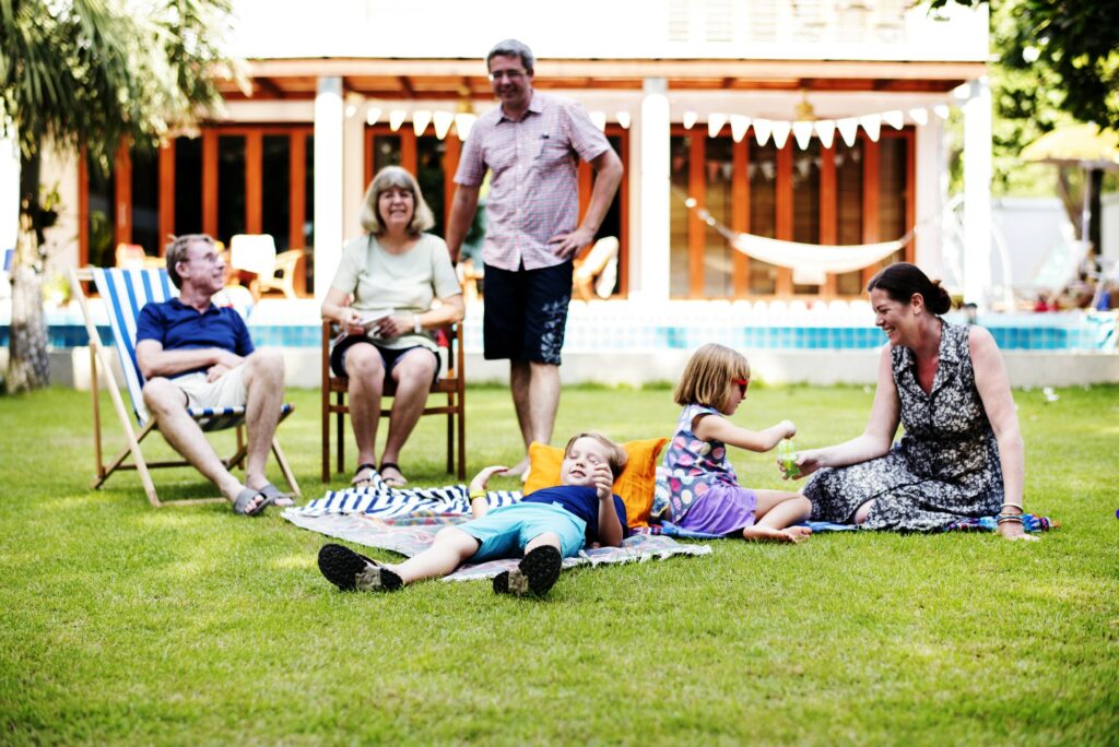 Caucasian family enjoying summer together at backyard